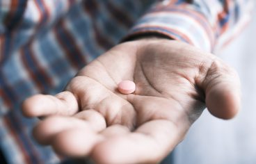 Merck Antiviral COVID-19 Pill Found to Cut Risk of Hospitalization, Death